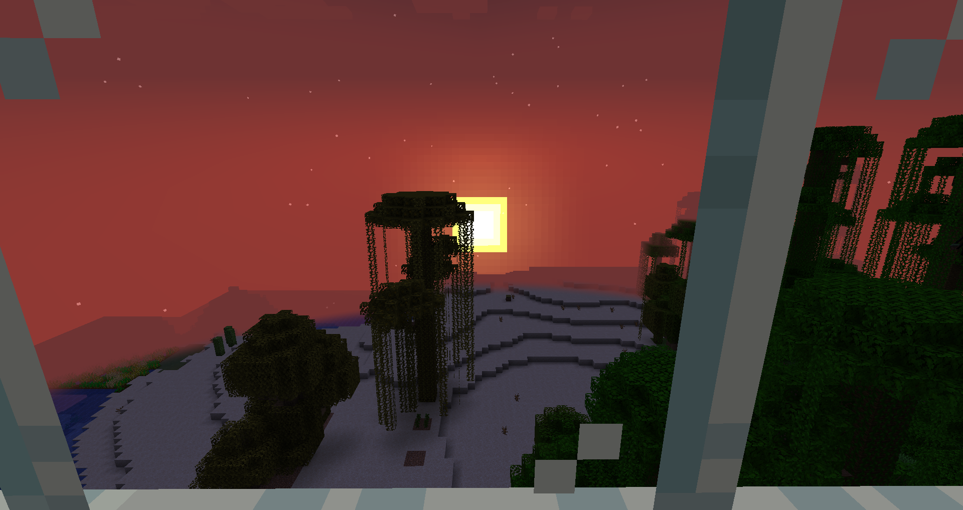 Looking out of the window in the treehouse. The cube sun is setting in the distance.